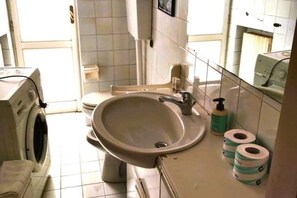 Shower, bidet, towels, soap