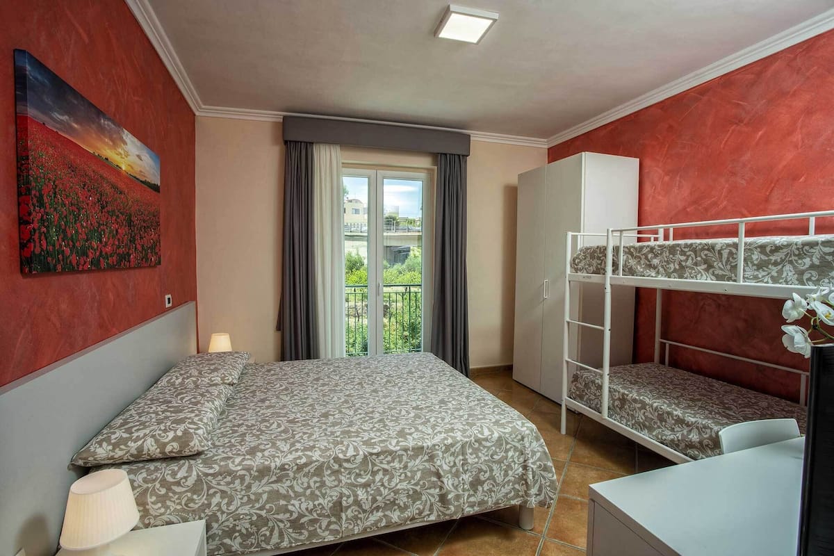 Quadruple Room, Garden View | Free minibar, soundproofing, free WiFi