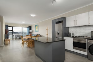 Fridge, microwave, oven, stovetop - 2 Bed Apartment in Century City | Pool (Cape Town)