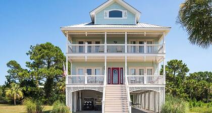 Stunning Marsh Views, 2 Golf Carts Included, 2 Master Suites, expansive decks with ocean breeze