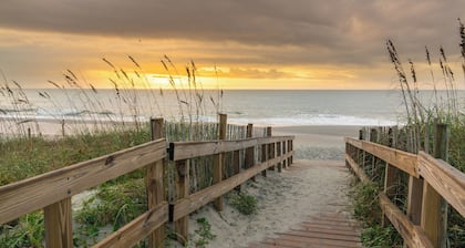 Stunning Marsh Views, 2 Golf Carts Included, 2 Master Suites, expansive decks with ocean breeze
