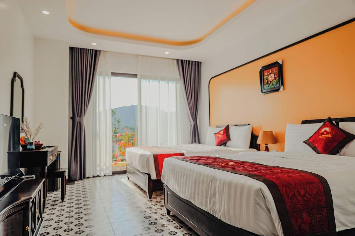 Executive Quadruple Room, Balcony | Hypo-allergenic bedding, minibar, desk, laptop workspace