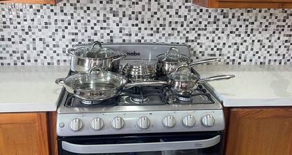 The Home Stay:
Cozy 2-bedroom apartment in fantastic La Resource Rd., D'Abadie.