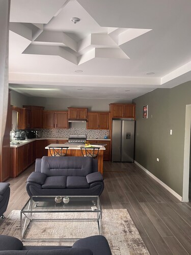 The Home Stay:
Cozy 2-bd 1 ba apt, laundry room, near La Resource Rd., D'Abadie.