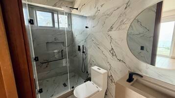Shower, hair dryer, towels, soap
