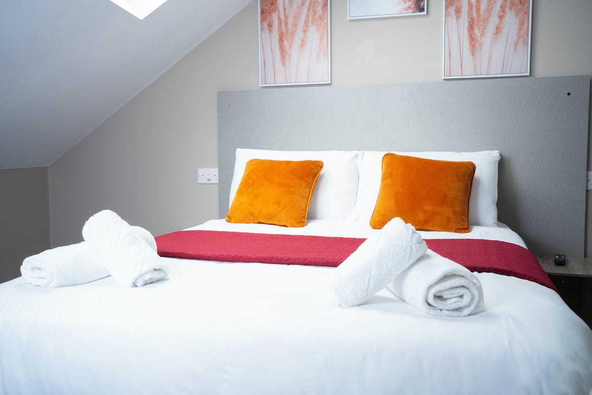 Laptop workspace, blackout curtains, soundproofing, iron/ironing board