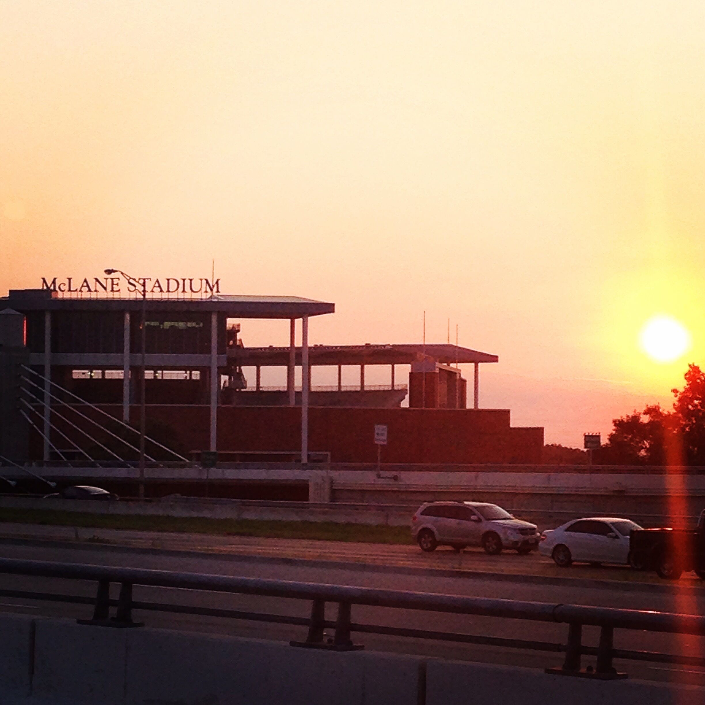A stadium with a clear view of the McLane Stadium sign.