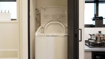 Fridge, microwave, coffee/tea maker, cookware/dishes/utensils