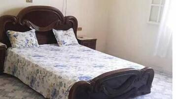 3 slaapkamers, een strijkplank/strijkijzer, beddengoed