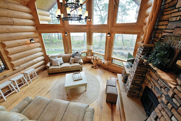 House, Multiple Beds, Jetted Tub (Osprey Lake Cabin) | Living area | 32-inch TV with digital channels, fireplace