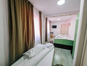 Habitación triple clásica, vistas a la montaña | Wifi gratis