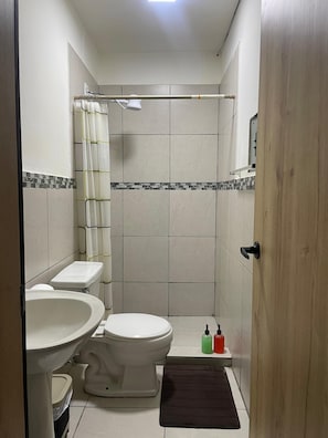 Shower, towels, soap, shampoo