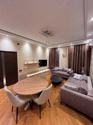 Living area - Modern 2BR Cozy Haven on Nizami St with a Balcony (Baku)
