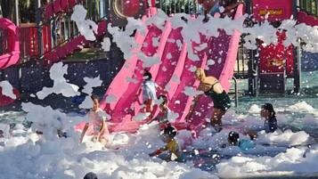 A water play area with slides and water features.