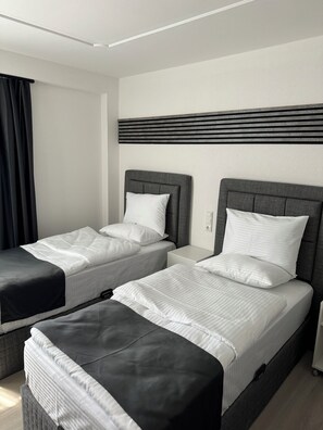 Kamar Twin | Selimut bulu angsa, meja kerja, dan Wi-Fi gratis