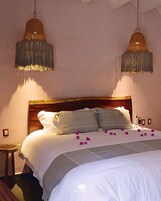 Frette Italian sheets, premium bedding, down comforters