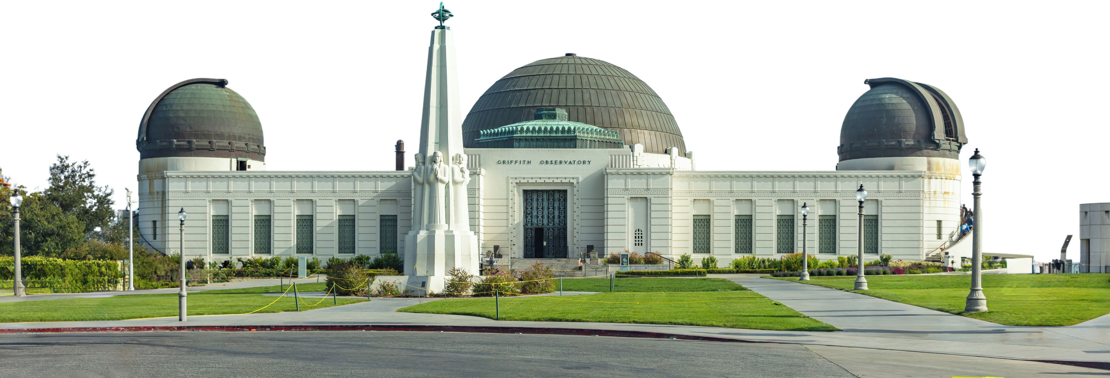 A large observatory with three domes, a central tower, and a symmetrical facade.