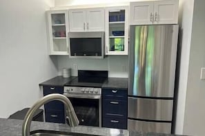 Fridge, microwave, oven, stovetop - Whale Lodge 2 Bedroom Condo (Horry County)