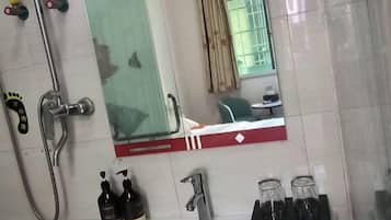 Shower, hair dryer, slippers, shampoo