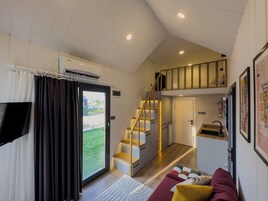 Standard Suite, 1 King Bed with Sofa bed, Private Bathroom, Pool View | 1 bedroom, premium bedding, down comforters, individually decorated