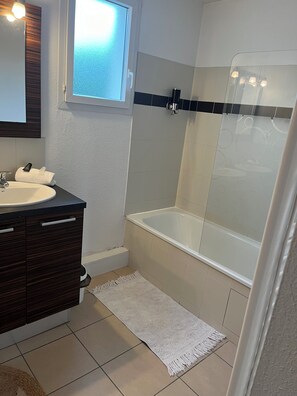 Hair dryer, towels, soap, toilet paper