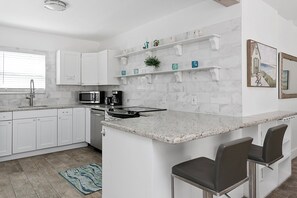 Deluxe Apartment, Partial Ocean View | Private kitchen | Microwave, oven, stovetop, cookware/dishes/utensils - Spacious 1 Bedroom APT at the beach (Hollywood)