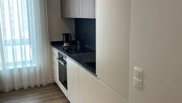 Apartamento Deluxe | Cocina privada | Hervidor eléctrico