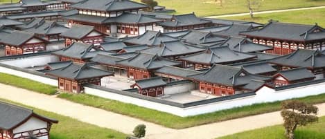 A traditional Japanese temple complex with multiple buildings arranged in a grid pattern.