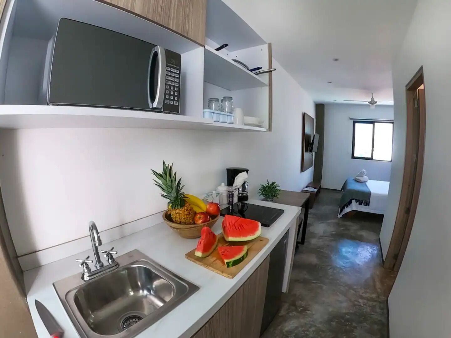 Departamento Prestigio, vista a la ciudad | Cocineta privada