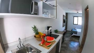 Departamento Prestigio, vista a la ciudad | Cocineta privada