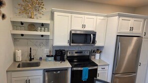 Fridge, microwave, oven, stovetop - West Bay Views, Downtown TC (Traverse City)