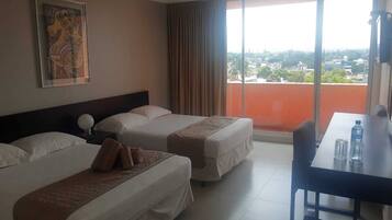 Deluxe Double Room, Balcony, City View | Desk, iron/ironing board, free WiFi