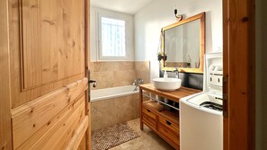 Shower, towels, soap, toilet paper