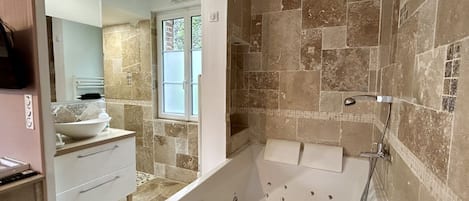 Shower, jetted tub, hair dryer, towels