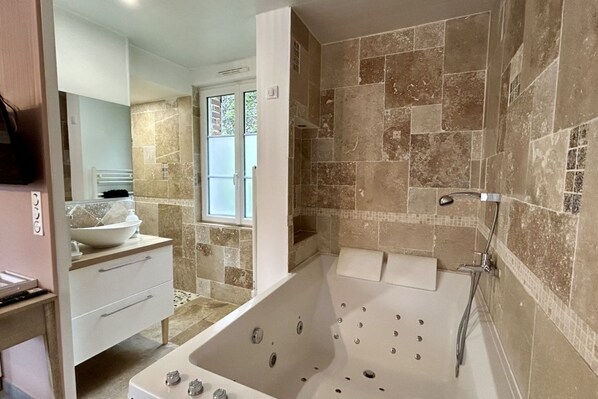 Shower, jetted tub, hair dryer, towels