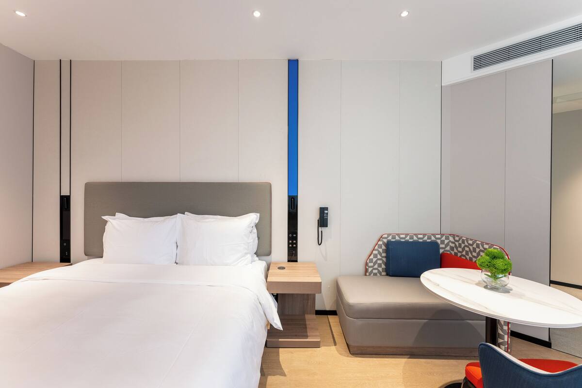 Premium bedding, down comforters, desk, laptop workspace