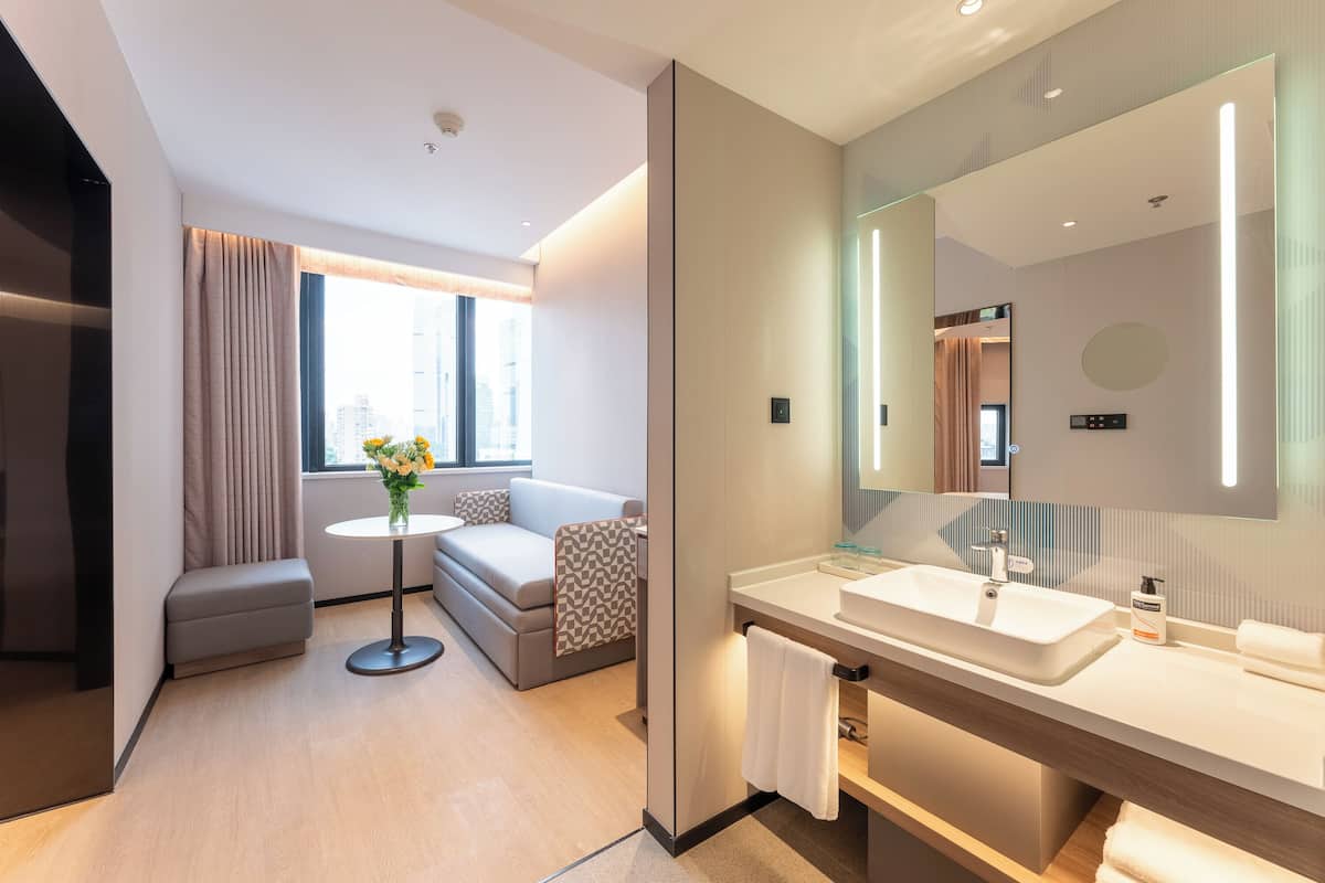 1 King Suite Sofa Bed | Living area | 50-inch flat-screen TV with cable channels