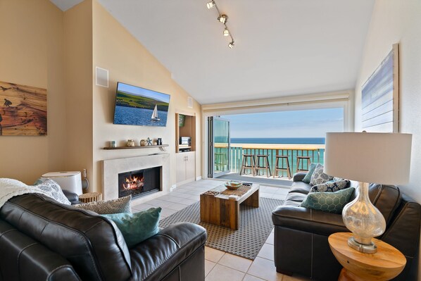 Smart TV, fireplace, books, stereo