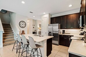 Fridge, microwave, oven, stovetop - 8BR Lovely Villa • Swing Set • Pool • Near Disney (Kissimmee)
