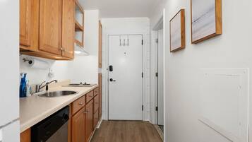 Fridge, microwave, cookware/dishes/utensils