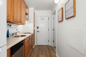 Fridge, microwave, cookware/dishes/utensils