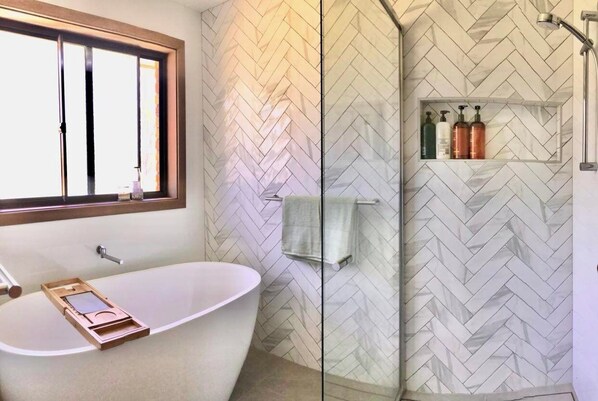 Shower, hair dryer, towels, soap