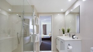 Shower, hair dryer, shampoo