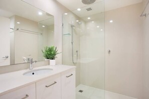 Shower, hair dryer, shampoo