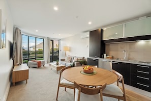 Apartment, Courtyard View | Living area | Flat-screen TV - The Beacon - Town Centre Apartment 620 (Queenstown)