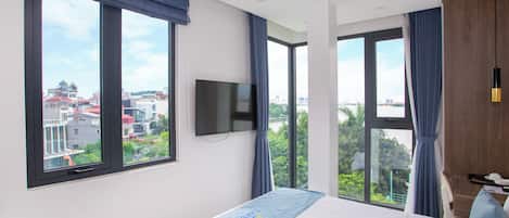 Camera Deluxe con letto matrimoniale o 2 letti singoli | Minibar, Wi-Fi gratuito, lenzuola
