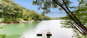 Lakefront home with mountain views, grill, firepit and dock