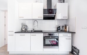 Réfrigérateur, four, plaque de cuisson, lave-vaisselle