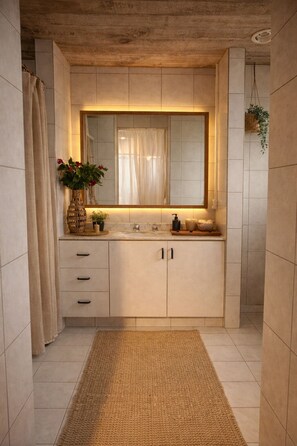 Shower, towels, soap, toilet paper