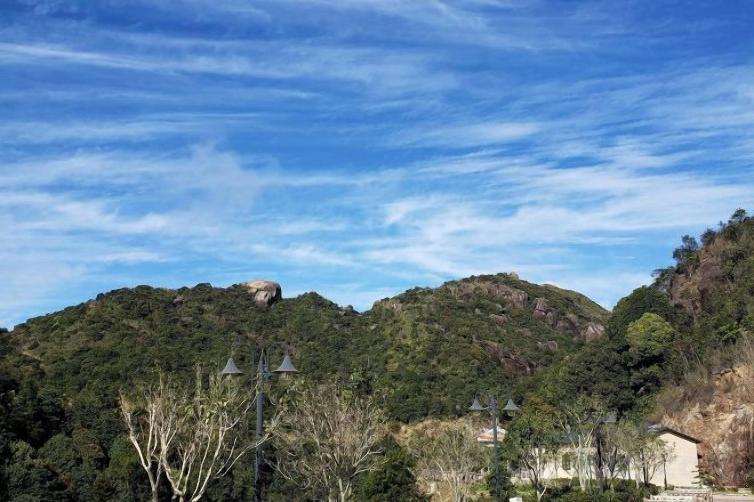 A mountainous landscape with a clear sky.